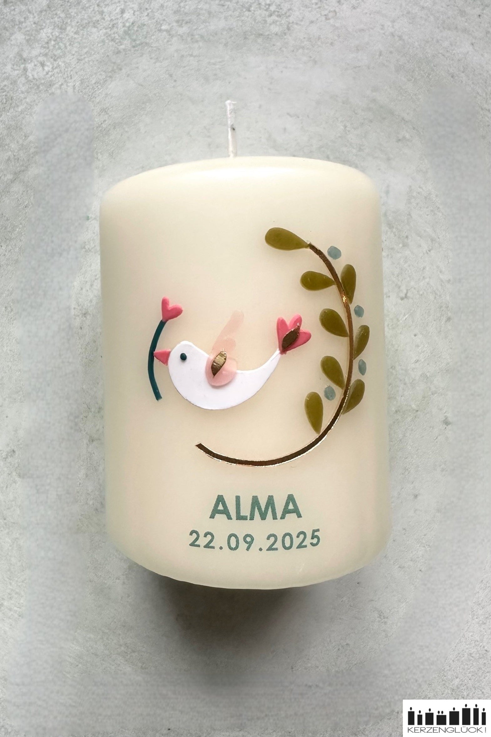 Gastgeschenkkerze „Kranz mit Symbolen"