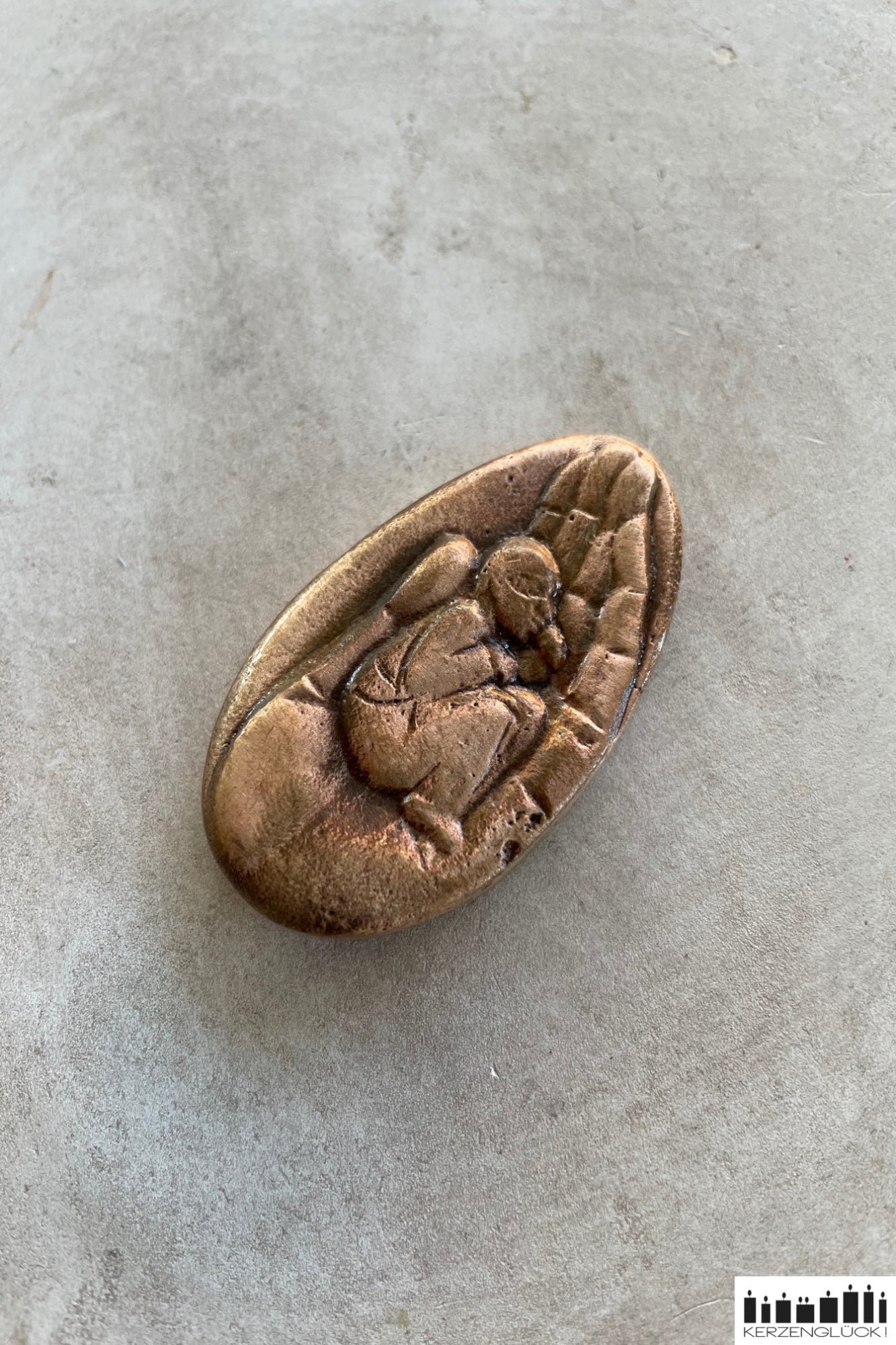 Handschmeichler aus Bronze "Geborgen in Gottes Hand"