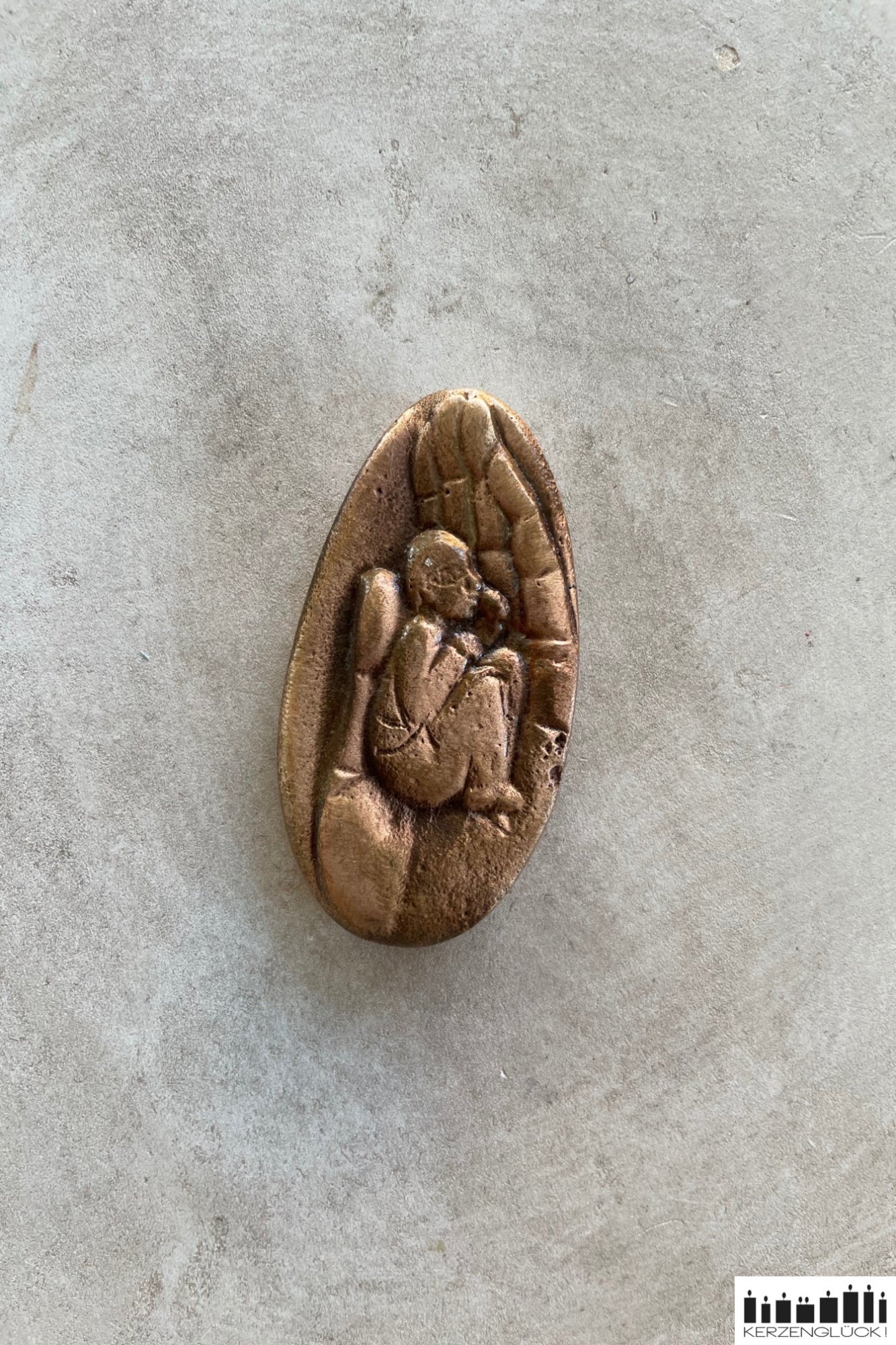 Handschmeichler aus Bronze "Geborgen in Gottes Hand"