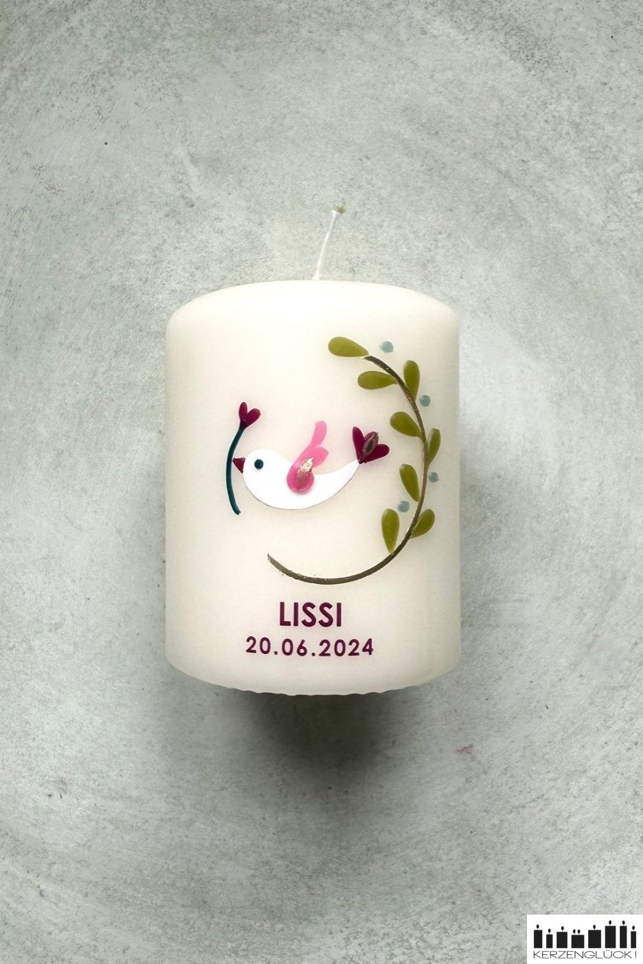 Gastgeschenkkerze „Kranz mit Symbolen"