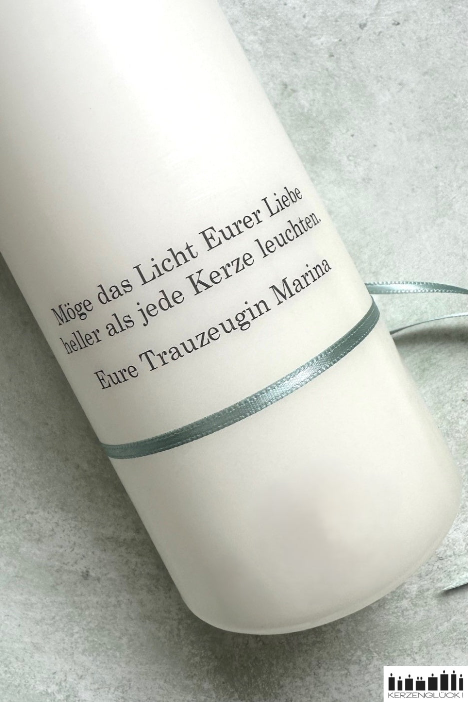 Individueller Spruch auf Kerzenrückseite